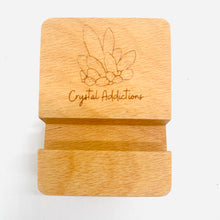 Load image into Gallery viewer, Wooden Etched &#39;Crystal Addictions&#39; Phone Stand
