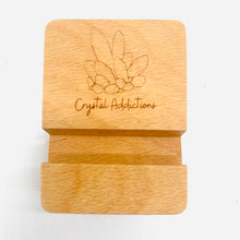 Load image into Gallery viewer, Wooden Etched 'Crystal Addictions' Phone Stand
